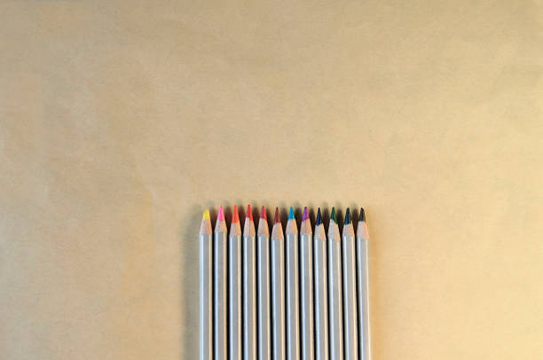 istock Colourful pencils on the paper background 972792150