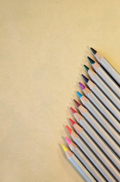 istock Colourful rainbow pencils for art on the paper background 972794264