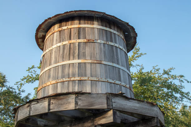 istock Rain Water collection basin barrel wood texas 972835544