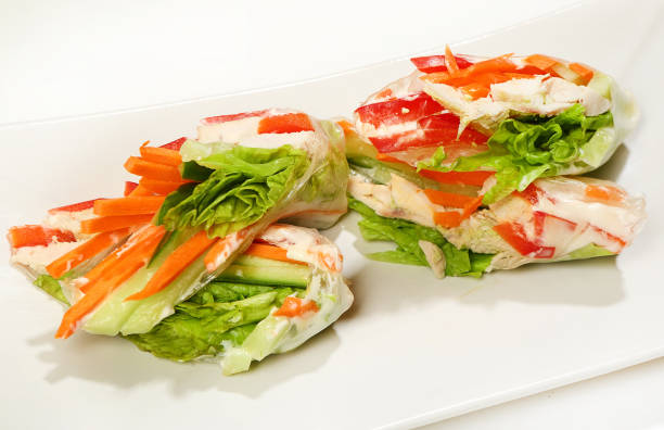 istock Pancakes with vegetables and chicken in rice paper 972835624