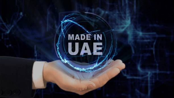 istock Painted hand shows concept hologram Made in UAE his hand 972842474