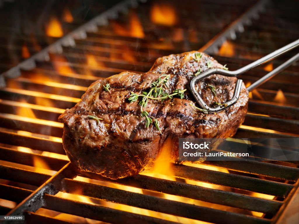 BBQ Sirloin Steaks with Fresh Thyme Barbecue Grill Stock Photo