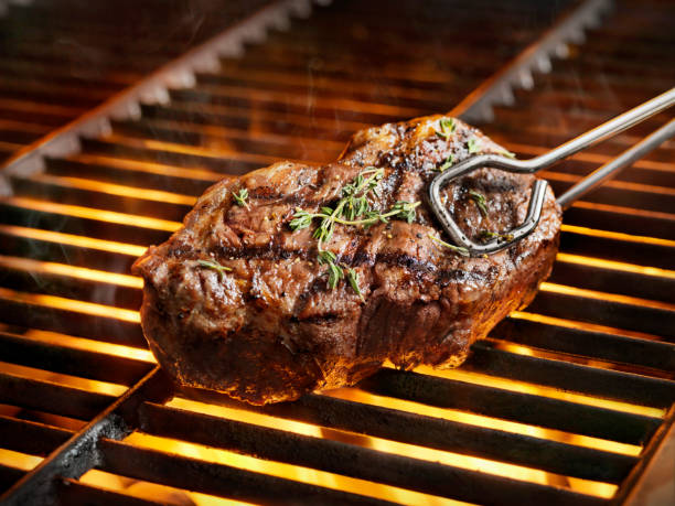 istock BBQ Sirloin Steaks with Fresh Thyme 972852872