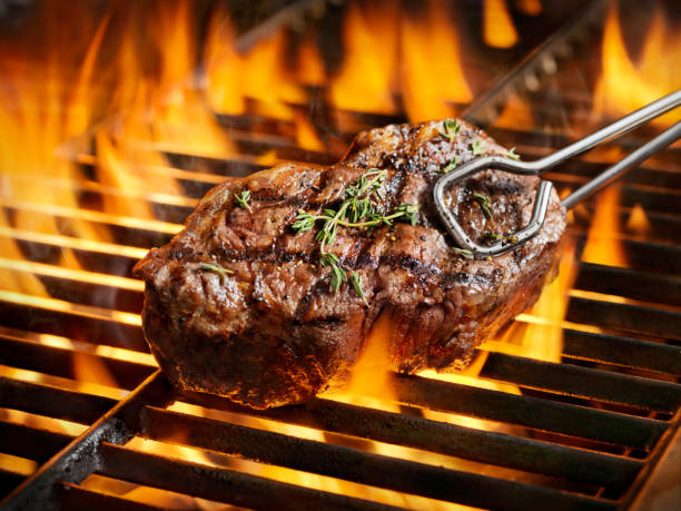 istock BBQ Sirloin Steaks with Fresh Thyme 972855164