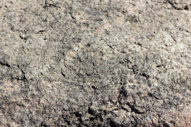 istock Granite surface, texture of old stone, blank for designer from natural material, granite pattern in vintage style, brown background for wallpaper, art 972858700