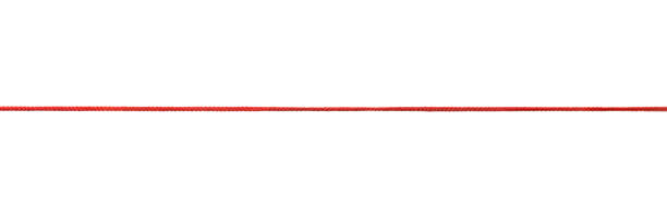 Red rope isolated Long straight red rope isolated on white thread sewing item stock pictures, royalty-free photos & images