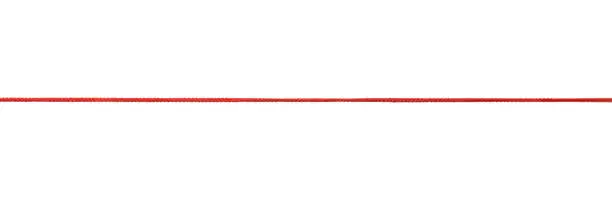 Long straight red rope isolated on white