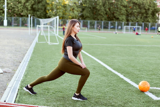 istock Young woman doing warm-up. 972877116