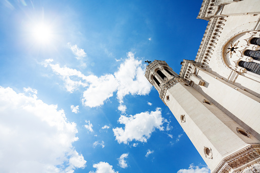 Low-angle view of the Basilica of Notre-Dame de Fourviere against blue sky, Lyon, France