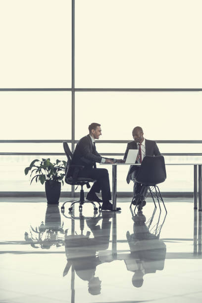 istock Outgoing employers talking in office 972880184