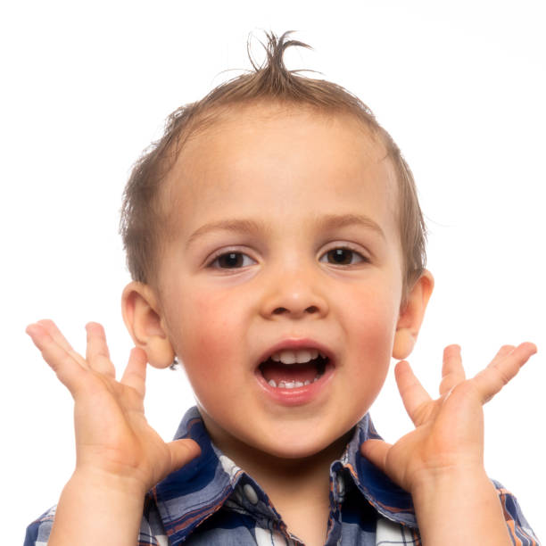 istock Little boy posing laughing 972892788