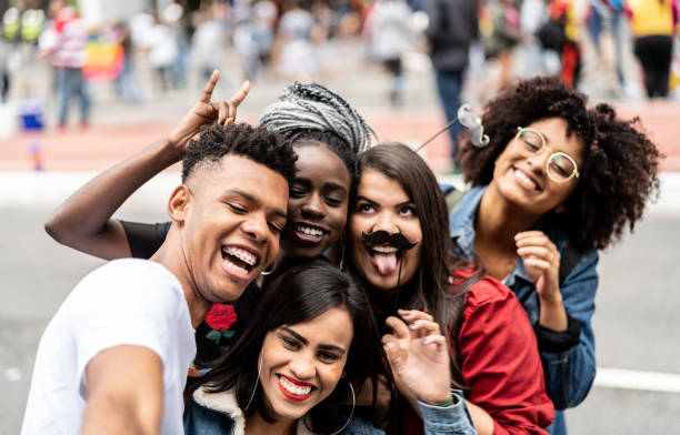 istock Authentic Group of Diverse Friends Taking a Selfie 972901960