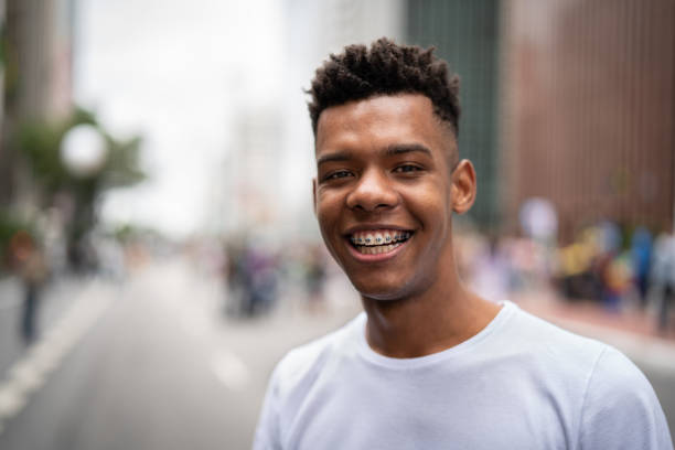 Brazilian Boy Smiling Portraits braces stock pictures, royalty-free photos & images