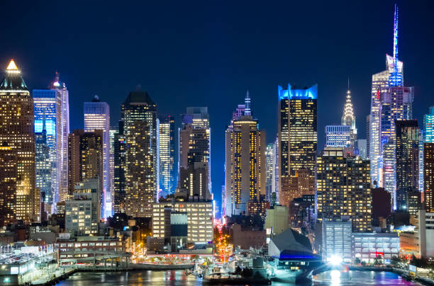 Midtown Manhattan skyline at night stock photo