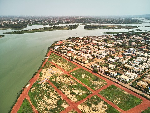 Bamako is the capital and largest city of Mali, with a population of 1.8 million. In 2006, it was estimated to be the fastest-growing city in Africa and sixth-fastest in the world. It is located on the Niger River, near the rapids that divide the upper and middle Niger valleys in the southwestern part of the country.