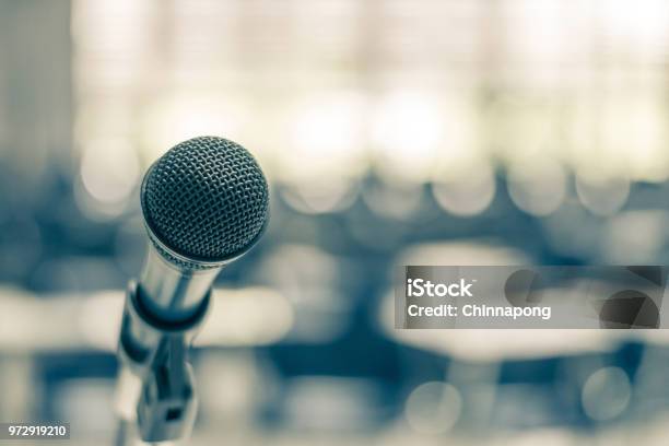 Microphone Voice Speaker In School Lecture Hall Seminar Meeting Room Or Educational Business Conference Event For Host Teacher Or Coaching Mentor Stock Photo - Download Image Now