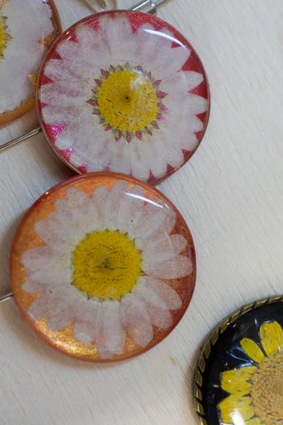 istock pendant with dry  flower inside resin 972934482