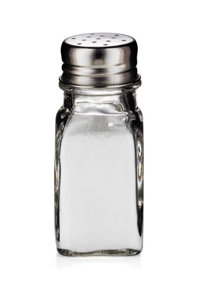 istock A glass shaker of table salt isolated on white background 972936792