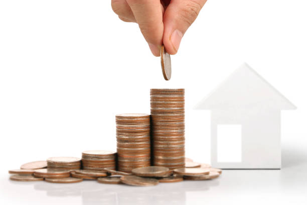 istock human hand putting coin to money 972944548