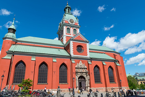 Stockholm, Sweden - June 04, 2015: View of the church Sankt Jacobs kyrka (Saint James's Church), along with people in central Stockholm, Sweden