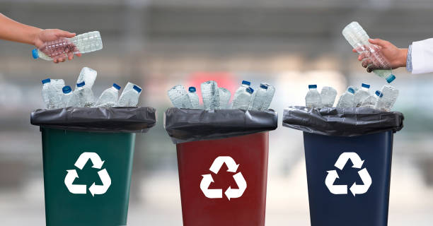 istock man hand putting plastic reuse for recycling concept environmental protection world recycle 972974202