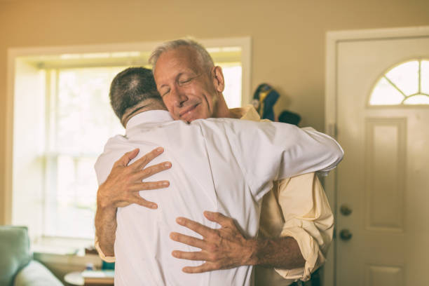 istock loving middle aged gay couple 972988244