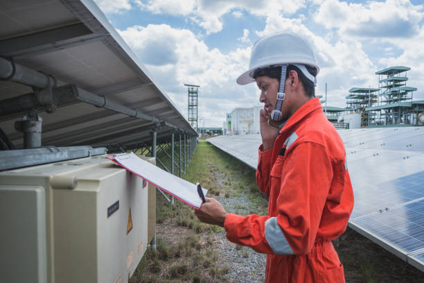 istock operation and maintenance in solar power plant ; engineering team working on checking and maintenance in solar power plant ,solar power plant to innovation of green energy for life 972994544