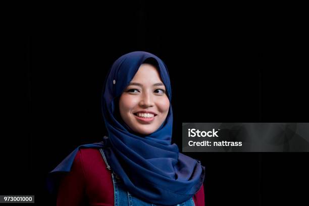 Portrait Of A Confident Muslim Woman Stock Photo - Download Image Now - Black Background, Headshot, Women