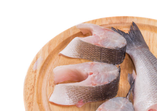 istock Fresh fish fillets located on the cutting board. 973011690