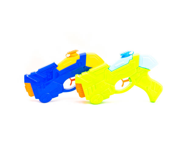 istock Close-up two water guns pool beach toy isolated on white 973011980