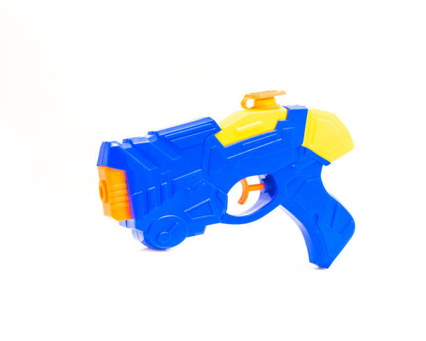 istock Close-up water gun pool beach toy isolated on white 973012046