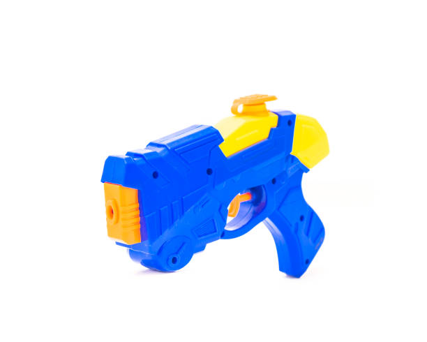 istock Close-up water gun pool beach toy isolated on white 973012064