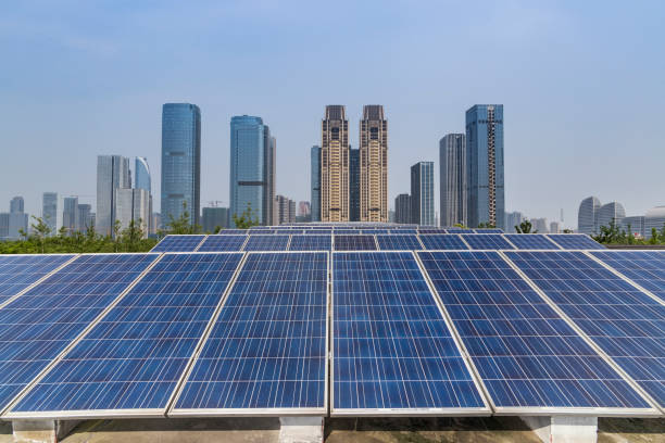 istock Solar and modern city skyline 973019454