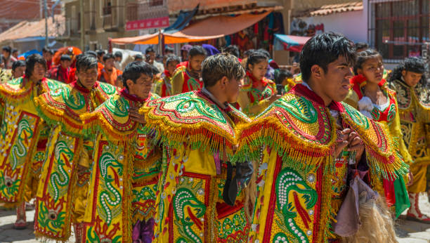 Bolivian Cultural Dances Celebration in La Paz Cultural event in the city of La Paz with young men and women wearing colorful traditional clothing and hats, while walking and dancing in the streets, Bolivia, South America. inti raymi stock pictures, royalty-free photos & images