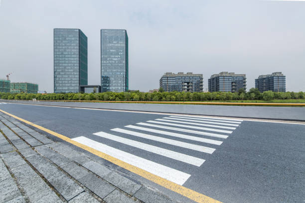 istock Panoramic skyline and modern business office buildings with empty road,empty concrete square floor 973022986