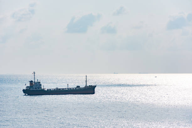 istock passenger boat on the sea at twilight 973025874