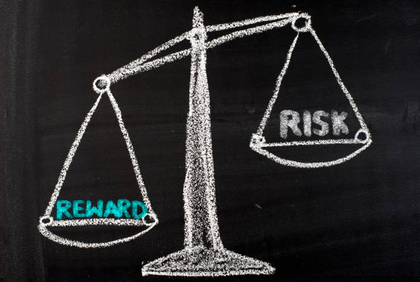 istock Risk and reward balance 973050182