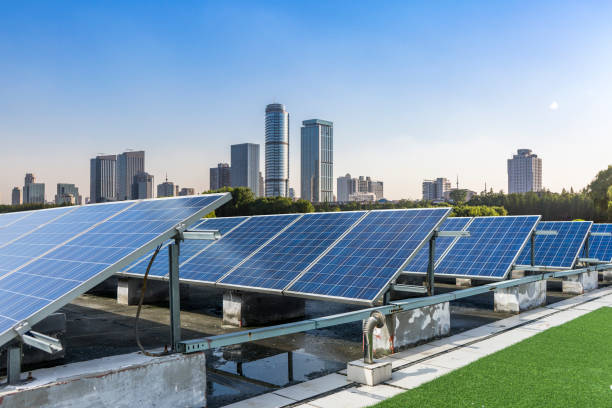 istock Solar and modern city skyline 973050800