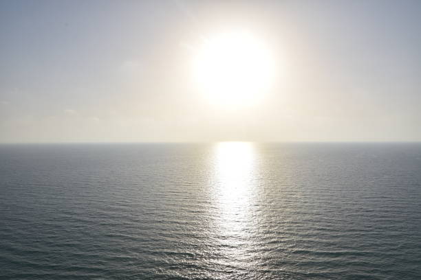 istock A glowing sunset at sea 973056680