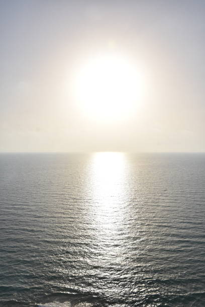 istock A glowing sunset at sea 973056794