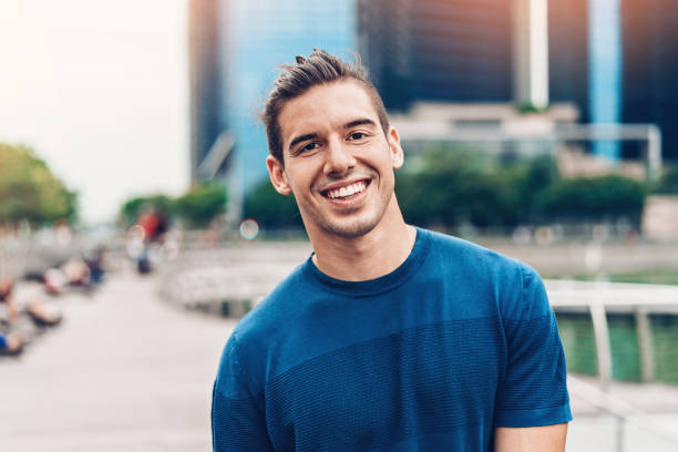 istock Portrait of a smiling young man 973062064