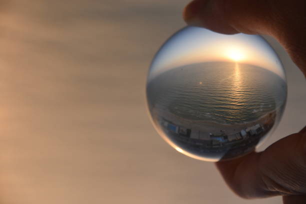 istock Concept - crystal ball at sunset 973066628
