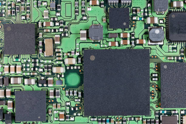istock Microchips and microcircuits with ball pins are installed on a modern electronic circuit board. 973066904