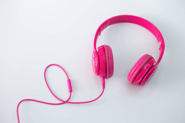 istock Pink headphones on a white background. 973070364