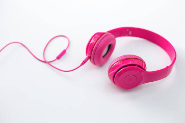 istock Pink headphones on a white background. 973070368