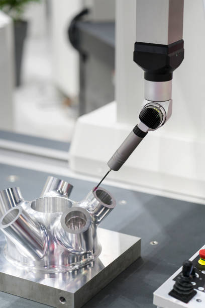 istock operator inspection automotive parts by CMM 973073454