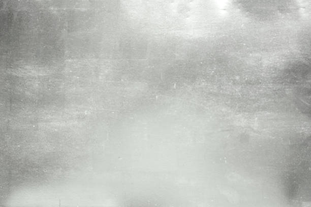 istock aluminium background or texture and gradients shadow.  silver background. 973075292