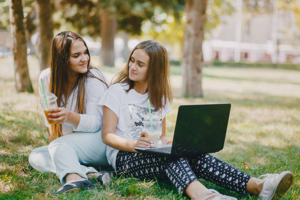 istock girls with a laptop 973082338