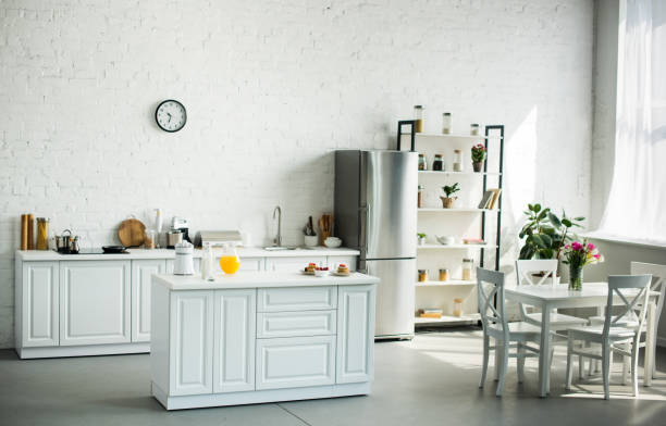 istock interior of modern light kitchen with furniture 973086156