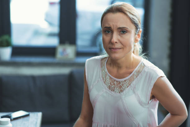 istock Pretty mature woman experiencing pain 973089072